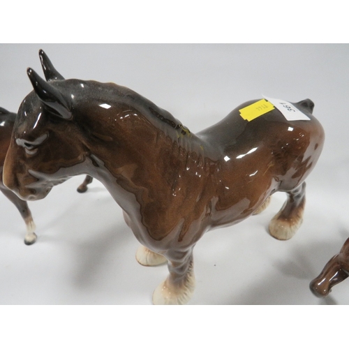 361 - Two Beswick bay horses together with a shire horse (3)