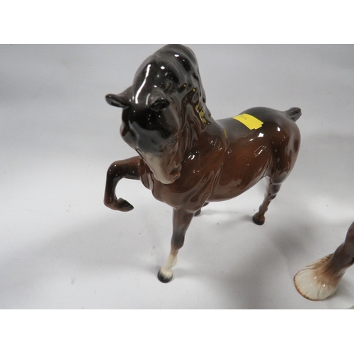 361 - Two Beswick bay horses together with a shire horse (3)