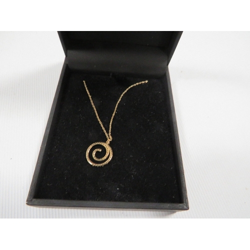 433 - A hallmarked 9 carat gold diamond swirl pendant on chain approx. weight 1.1g