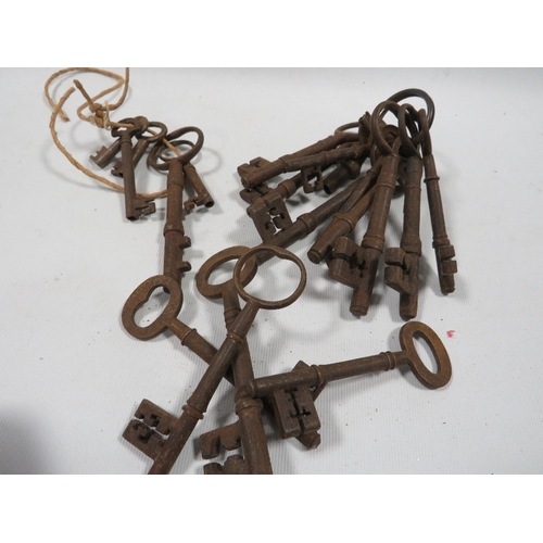 441 - A tin of antique keys