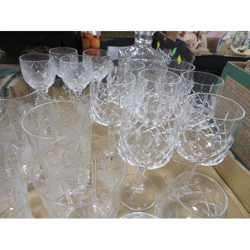 174 - Two trays of assorted cut glass etc to include drinking glasses, decanter etc