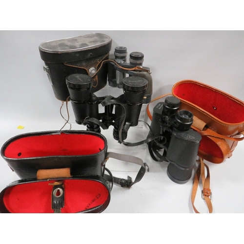 458 - Three assorted pairs of binoculars