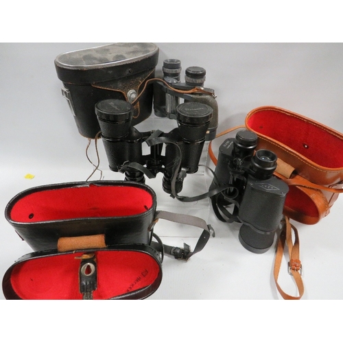 458 - Three assorted pairs of binoculars