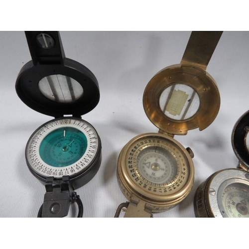 464 - Three assorted pocket compasses