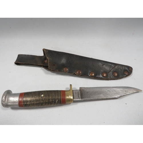 473 - A vintage dagger and sheath