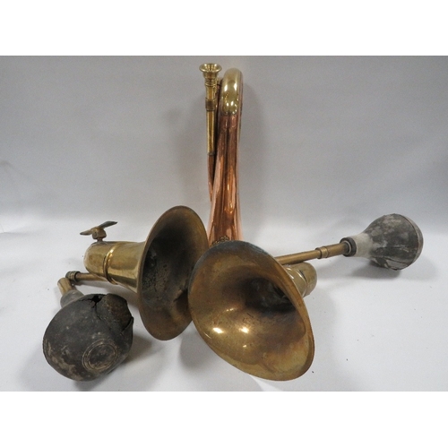 475 - A military bugle together with two vintage car horns A/F