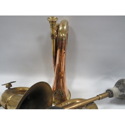 475 - A military bugle together with two vintage car horns A/F