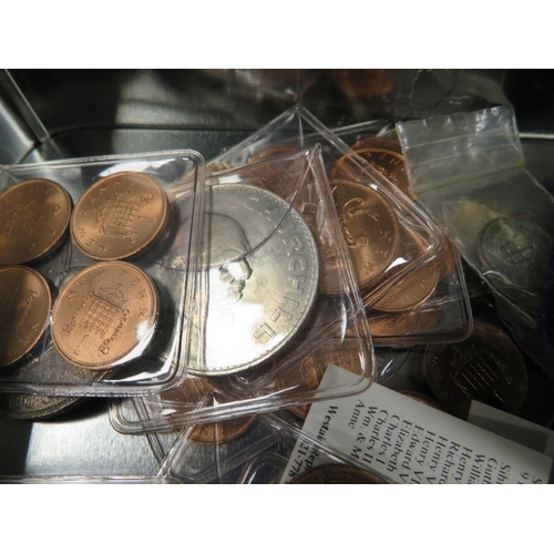 479 - A tin of assorted coins