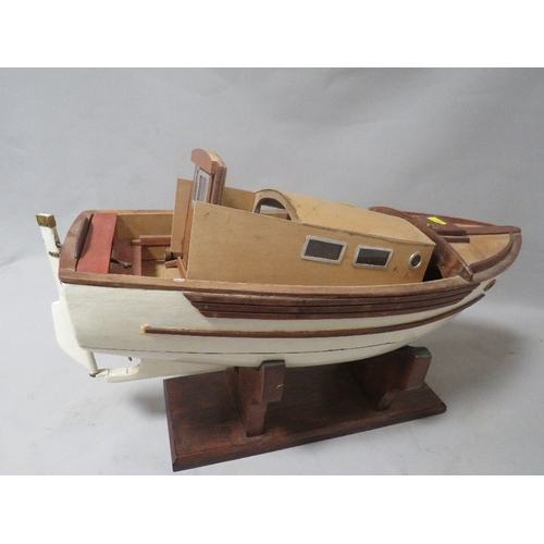 496 - A scratch built motorized model of a trawler boat on display stand