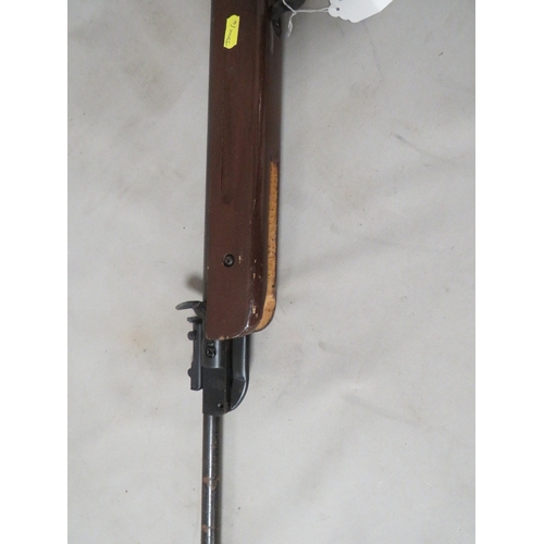 501 - A vintage air rifle with calibrated sight