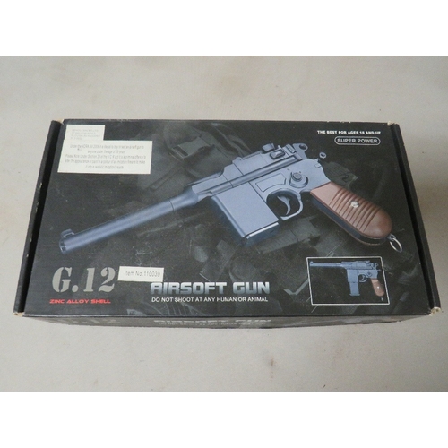 508 - A boxed G.12 air soft gun