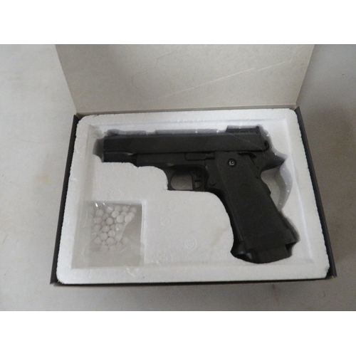 511 - A boxed GX10 zinc alloy shell air soft gun CAL 6mm dark blue colour