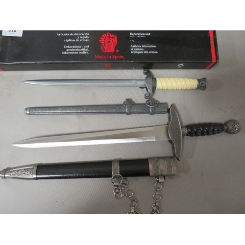 516 - Three reproduction daggers