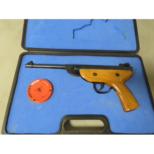 517 - A cased Pioneer air pistol and pellets