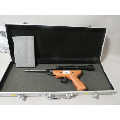 532 - A West Lake air rifle and sight with hard shell carry case