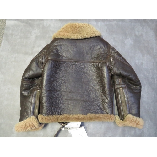 127 - A POST WAR IRVIN SHEEPSKIN FLYING JACKET