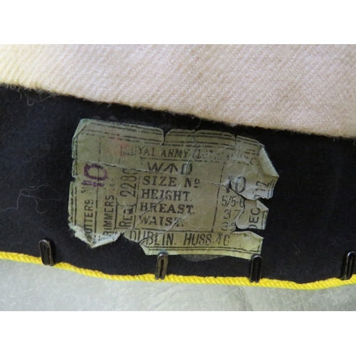 132 - A ROYAL HUSSARS TUNIC & TROUSERS, the tunic with label dated 1912