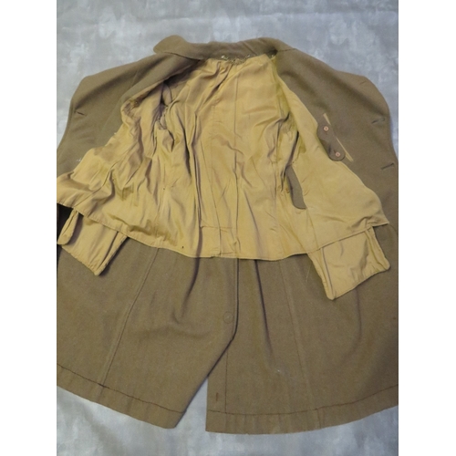 138 - A BRITISH ARMY OFFICERS GREAT COAT, with stay bright buttons