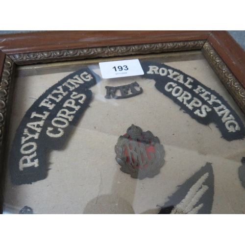 193 - A ROYAL FLYING CORPS BADGE COLLECTION IN FRAME, to include shoulder titles, cap and collar badges an... 