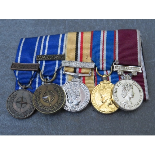 198 - FOUR BARS OF MINIATURE DRESS MEDALS, to include WW2 and NATO types