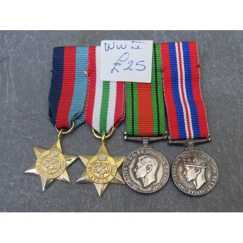 198 - FOUR BARS OF MINIATURE DRESS MEDALS, to include WW2 and NATO types