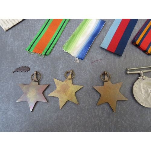 199 - WW2 MEDAL GROUP IN POSTAL BOX, 39-45 star, Atlantic star, Burma Star, Defence & War with mid oak lea... 