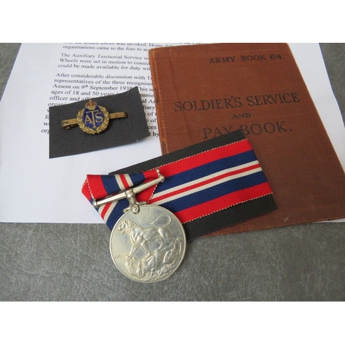 213 - WWII ATS PAYBOOK, BADGE AND WAR MEDAL, and a female ARP defence medal, both with a sheet of research