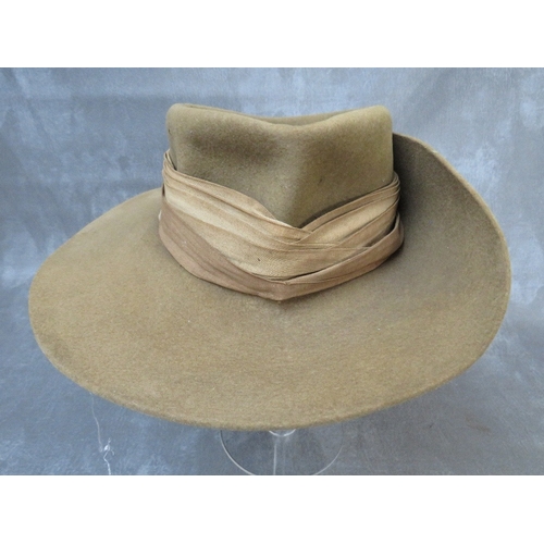 219 - A WW2 SLOUCH HAT WITH ROYAL SIGNALS BADGE