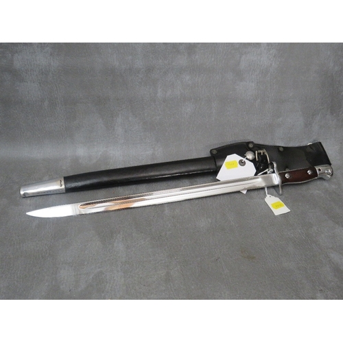 220 - A NICKEL-PLATED PARADE BAYONET, in scabbard with frog