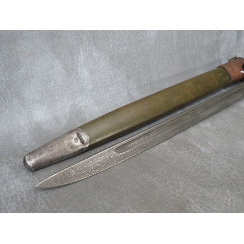 223 - A US WWI BAYONET, in scabbard, with leather frog