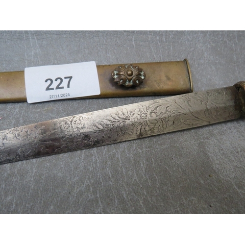 227 - AN ANTIQUE ITALIAN STILLETO DAGGER, with engraved blade, brass grip and scabbard