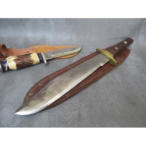 231 - A COLLECTION OF VARIOUS KNIVES, to include a US pilot survival type, a Bowie style in leather scabba... 