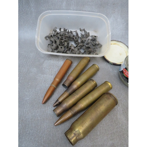 241 - A BOX OF INERT SHELL AND BULLET CASES, to include a 30mm armour piercing round, SA80 rounds in speed... 