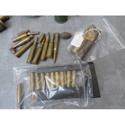 241 - A BOX OF INERT SHELL AND BULLET CASES, to include a 30mm armour piercing round, SA80 rounds in speed... 