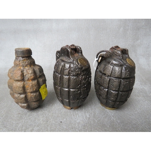 248 - TWO MILLS BOMB GRENADES, dated 1916 A/F, along with another grenade, all A/F, all inert (3)