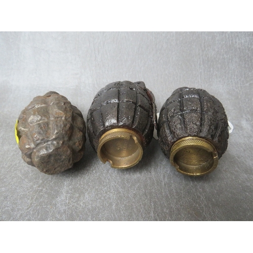 248 - TWO MILLS BOMB GRENADES, dated 1916 A/F, along with another grenade, all A/F, all inert (3)