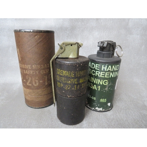 249 - A US OFFENSIVE GRENADE, dated 1974, in original box, along with a training smoke screen grenade, bot... 