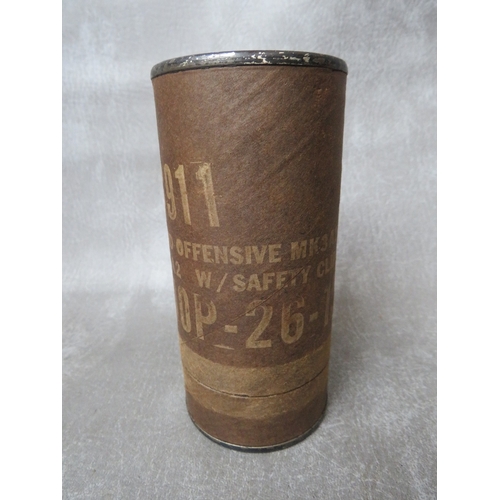 249 - A US OFFENSIVE GRENADE, dated 1974, in original box, along with a training smoke screen grenade, bot... 