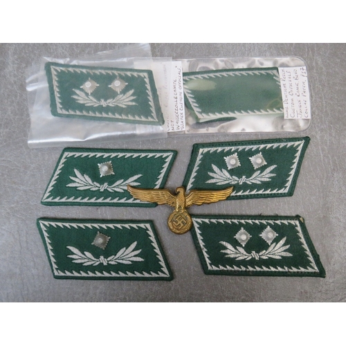 266 - A COLLECTION OF GERMAN CUSTOMS OFFICERS COLLAR PATCHES, and a brass breast / cap eagle