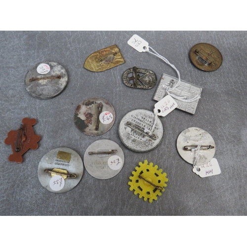 267 - A COLLECTION OF THIRD REICH DAY BADGES, brass, aluminium and plastic types (12)