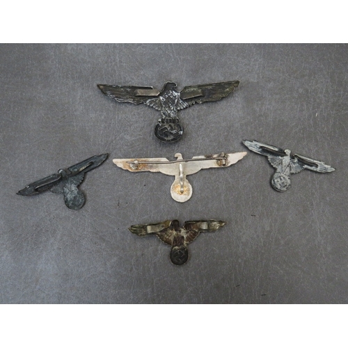 273 - A COLLECTION OF GERMAN WW2 TYPE EAGLE BADGES (Copies)