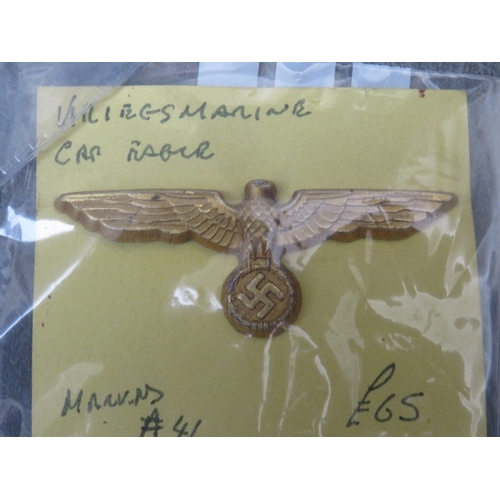 279 - KRIEGSMARINE METAL CAP EAGLE (MARKED A41), along with an Officers bullion eagle and a cloth example