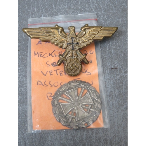 282 - A WW2 GERMAN VETERANS BREAST EAGLE BADGE, Mecklenburg Veterans Assoc. badge and a Flanders cross