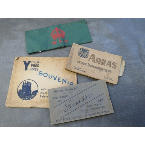 327 - A SMALL BOX OF MILITARY AND HOME FRONT COLLECTABLES, to include a copy Women's Land Army armband, va... 