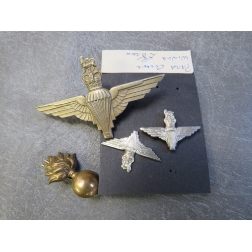 327 - A SMALL BOX OF MILITARY AND HOME FRONT COLLECTABLES, to include a copy Women's Land Army armband, va... 