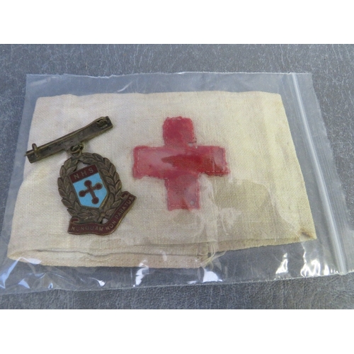 328 - A WWI RED CROSS ARMBAND, a Territorial Royal Army Medical Corps, South Midland title and a Queens Pa... 