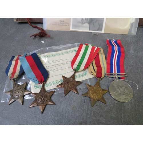 356 - A WW2 MEDAL GROUP DOCUMETNS AND PHOTOALBUMS OF AJN HOLMAN YINDRICH, WAR CORRESPONDANT, medal group 1... 