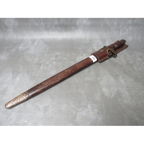 259 - A REMINGTON 1913 BAYONET, with issue mark 3 17, with wooden grooved grip, in scabbard with leather f... 