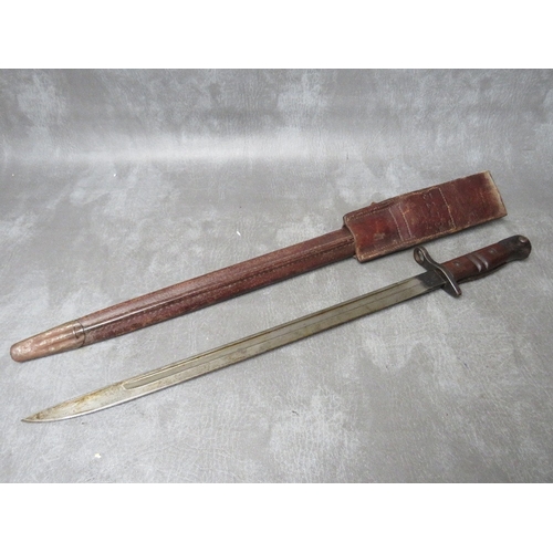 259 - A REMINGTON 1913 BAYONET, with issue mark 3 17, with wooden grooved grip, in scabbard with leather f... 