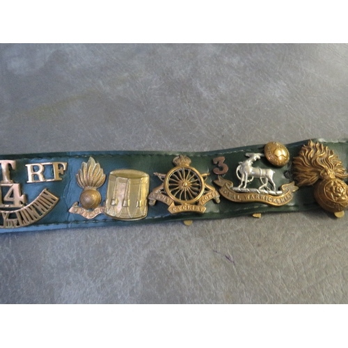 363 - A LEATHER BELT OF MILITARY BADGES AND BUTTONS, to include 'T14 County of London' title and Army Cycl... 